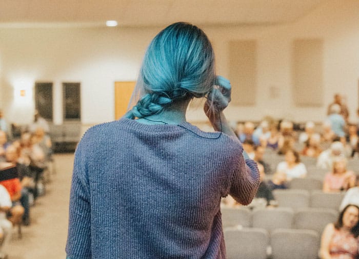 Woman talking to a group